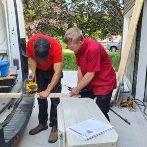 Two men working on a project