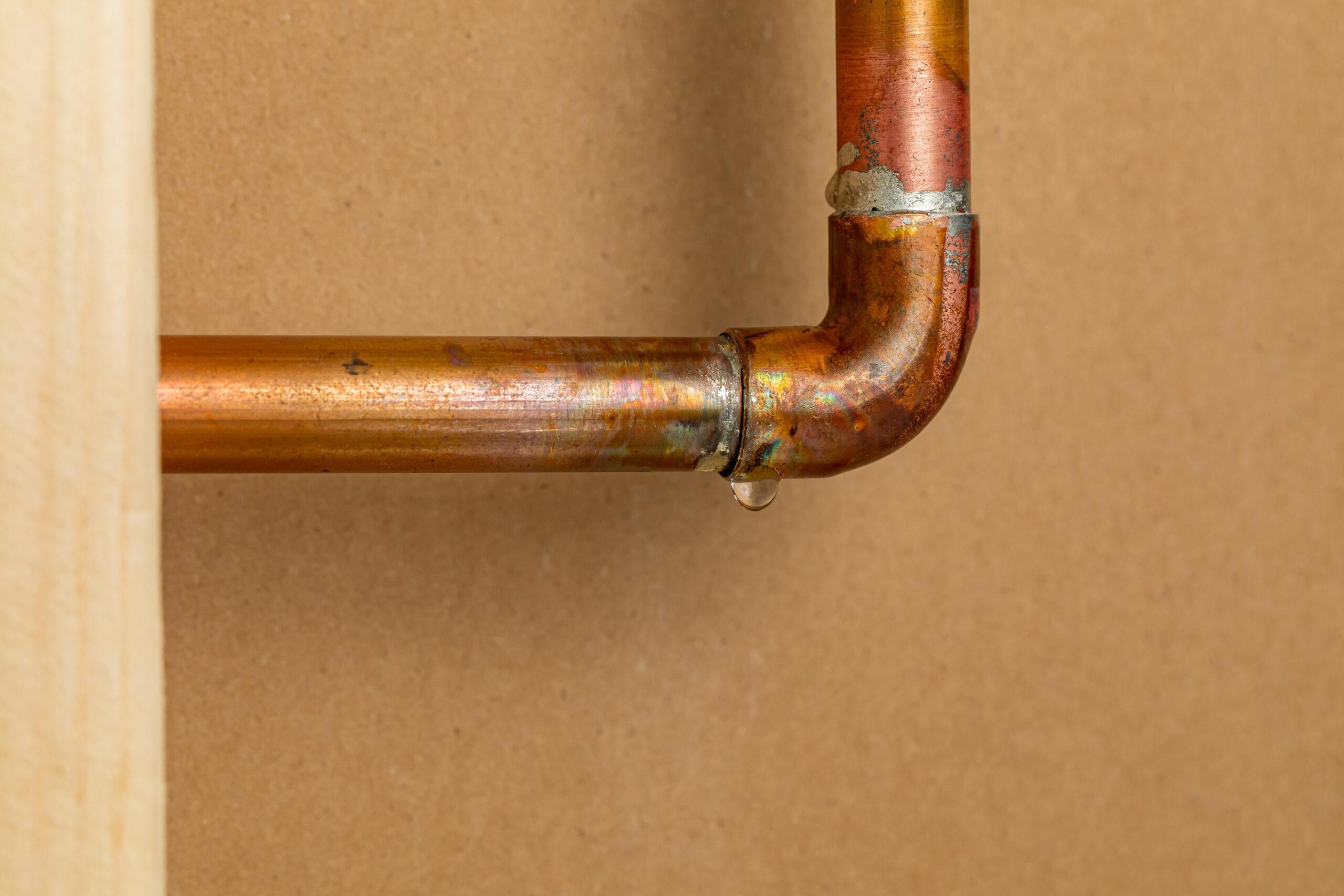 Cracked water pipe damaged from freezing temperatures in an Ontario home basement