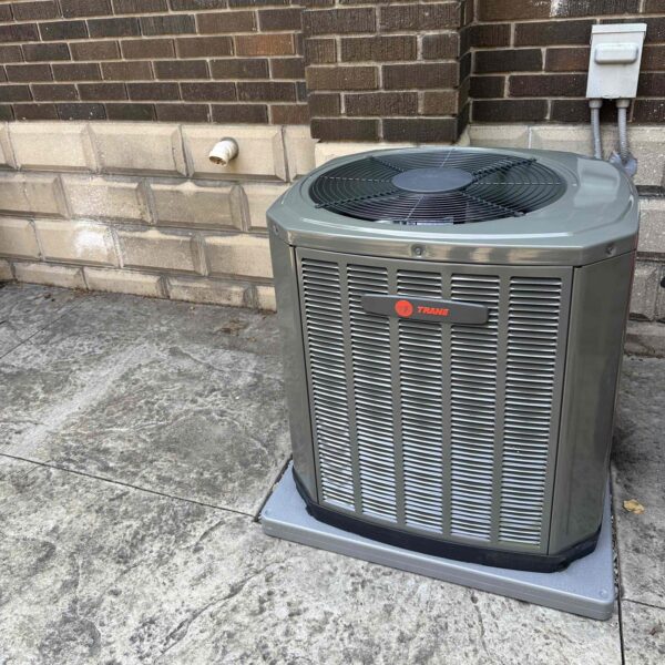 New Trane A/C unit installed by Donaldson Home Services in the backyard of a home in London, Ontario.